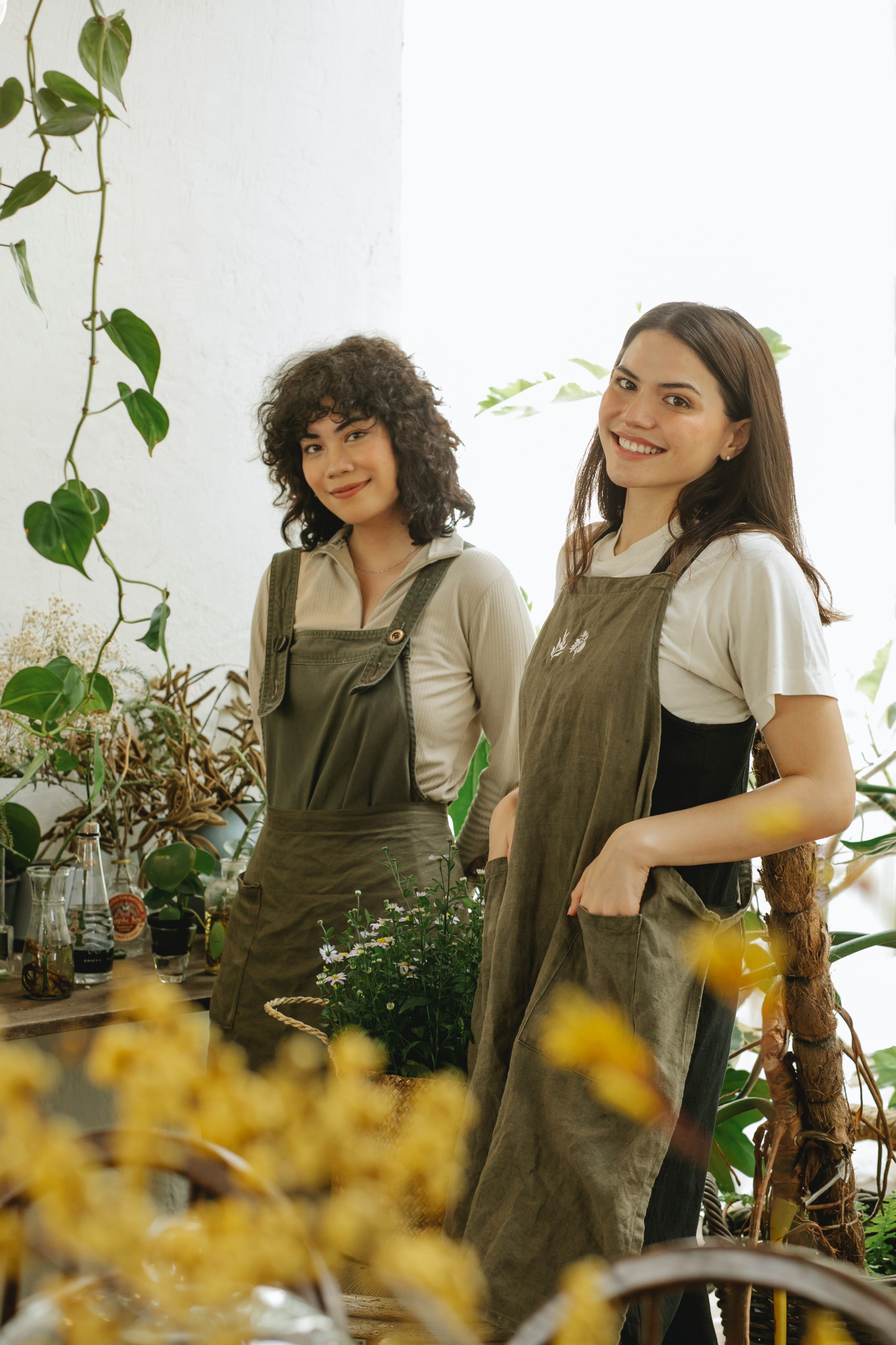 two woman in flower shop